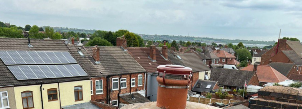 This is a photo taken from a roof which is being repaired by MCM Roofing Repairs Lymington, it shows a street of houses, and their roofs