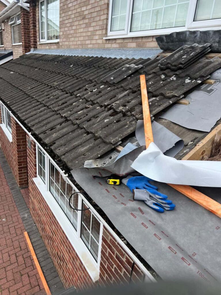 This is a photo of a pitched roof which is being repaired. The existing roof was leaking badly. Works carried out by MCM Roofing Repairs Lymington